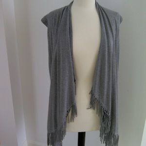 Shawl vest with fringe. Saks.